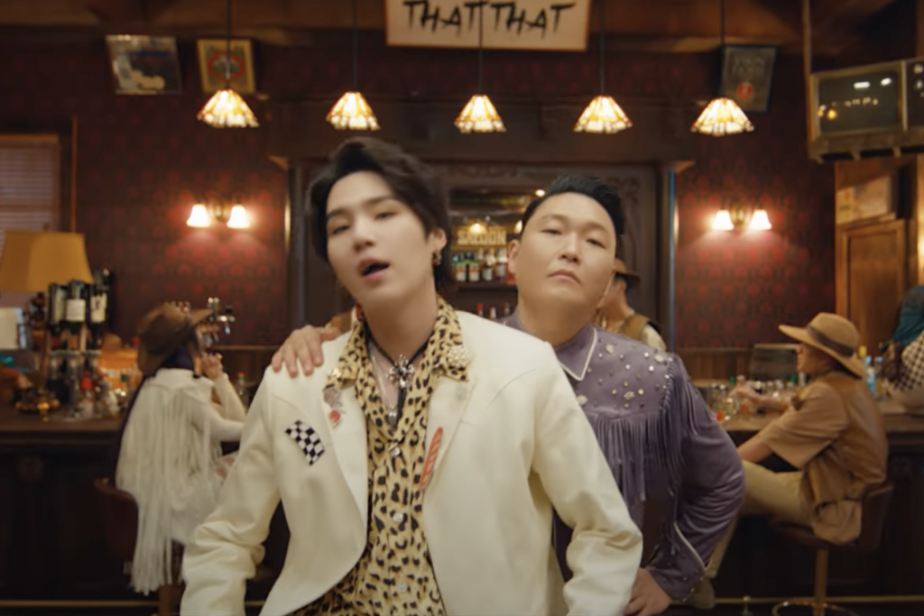شاهد Psy و Suga من BTS 'That That' Music Video